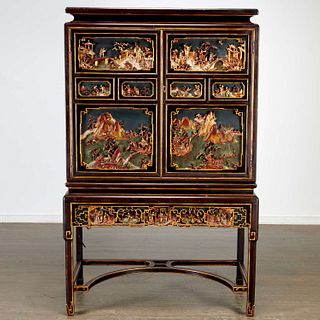 Chinese Export carved lacquered cabinet on stand