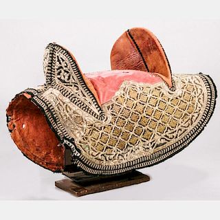 A Traditional Arabian Style Leather and Metallic Embroidered Saddle, 20th Century.