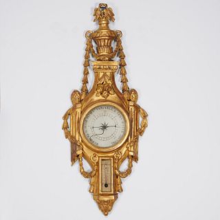 Louis XVI giltwood wheel barometer