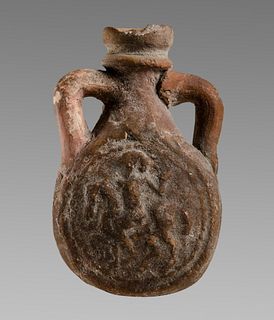 Ancient Byzantine Terracotta Piligrim Flask c.6th century AD. Size 3 5/8 inches high. twin handled terracotta piligrim flask decorated with horse ride