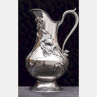 A French Art Nouveau Silver Repoussé Pitcher, 20th Century.