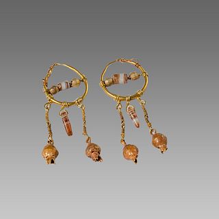 A pair of Islamic Gold Earrings with banded agate beads. 