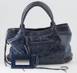 Balenciaga Dark Blue Distressed Leather Chevre Purse Shoulder Bag, the exterior with aged brass hardware and a front zip compartment...