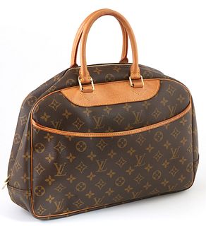 Louis Vuitton Brown Monogram Coated Canvas Deauville Shoulder Bag, the exterior with an open side pocket and vachetta leather handle...