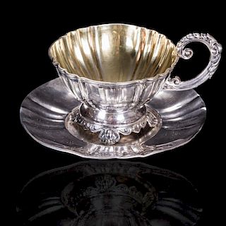 A French Silver Cup and Saucer with Gilt Wash, 19th Century.