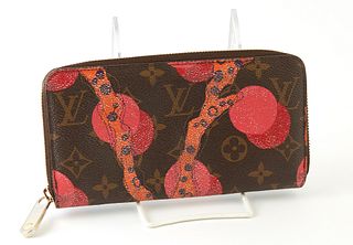 Louis Vuitton Limited Edition "Ramage" Zippy Wallet, the brown coated canvas "Ramage" edition monogram canvas with a golden brass ac...