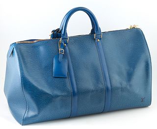 Louis Vuitton Keepall Blue Epi Calf Leather 50 Travel Bag, with golden brass hardware, opening to a blue suede interior, the exterio...
