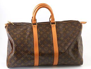 Louis Vuitton Brown Monogram Coated Canvas 45 Keepall Travel Bag, the vachetta leather straps with golden brass hardware, opening to...