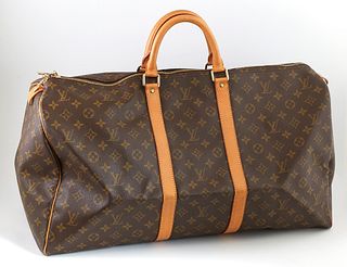 Louis Vuitton Brown Monogram Coated Canvas 55 Keepall Travel Bag, the vachetta leather straps with golden brass hardware, opening to...