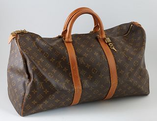 Louis Vuitton Brown Monogram Coated Canvas 50 Keepall Travel Bag, the vachetta leather straps with golden brass hardware, lock and k...