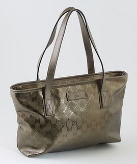 Gucci Grayish Bronze Guccissima Imprint Coated Canvas PM Tote Shoulder Bag, opening to a black interior with a side zip pocket and t...