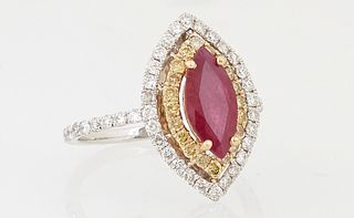 Lady's 18K White Gold Dinner Ring, with a 1.51 ct. marquise ruby, atop a conforming border of fancy yellow diamonds and a pierced ou...