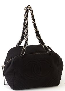 Chanel Black Canvas Logo Tote, c. 2004, with silver interlaced chain and black canvas handles, the interior of the bag lined in "CHA...