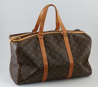 Louis Vuitton Brown Monogram Coated Canvas 45 Sac Souple Travel Bag, the vachetta leather strips and handles with yellow stitching, ...