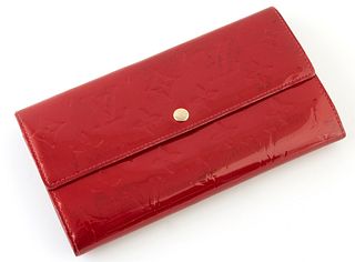 Louis Vuitton Rouge Fauviste Monogram Sarah 10 Wallet, the calf leather with golden brass accents, opening to two card holders, thre...