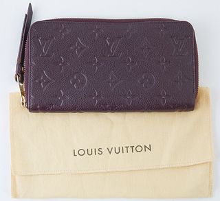 Louis Vuitton Dark Purple Monogram Empreinte Secret Wallet, the calf leather with golden accent zipper to leather pull, opening to t...