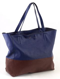 Celine Dark Blue and Brown Lamskin Leather Horizontal Bi-Cabas Tote Shoulder Bag, the bi-color bag with brass hardware, opening to a...