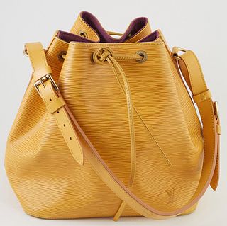 Louis Vuitton Noe Yellow PM Epi Leather Shoulder Bag, with yellow stitching and brass hardware, opening to a purple suede interior w...