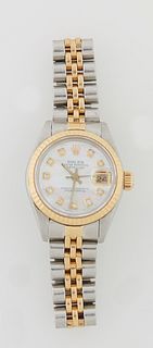Lady's Rolex 18K Yellow Gold and Stainless Steel Oyster Perpetual Datejust Wristwatch, with diamond mounted chapter marks and a moth...