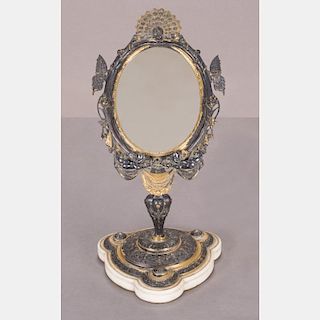 A Silver Plated with Gold Wash Figural Adjustable Table Mirror, 19th Century.