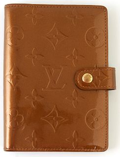 Louis Vuitton Agenda Cover, the bronze monogram embossed calf leather with pull snap, opening to card compartment, two bill compartm...