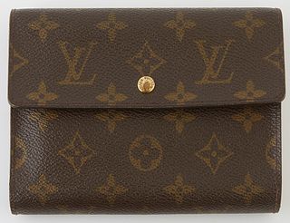 Louis Vuitton Porte-Tresor Etui Papier Wallet, the brown monogram coated canvas with a brass accent snap, opening to one card holder...