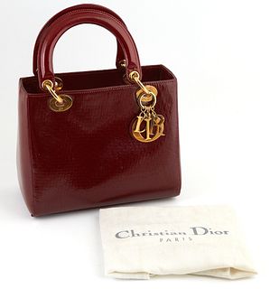 Christian Dior Burgundy Micro Diorissimo Patent Leather MM Lady Handbag, with golden brass accents and hanging "D-i-o-r" keychain, o...