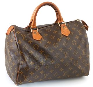 Louis Vuitton Brown Monogram Coated Canvas 30 Speedy Handbag, with golden brass hardware and vachetta leather handles, opening to a ...
