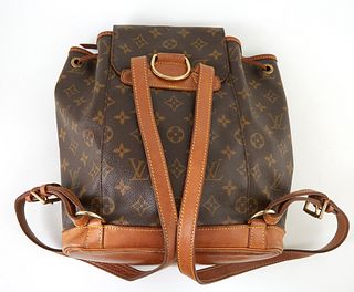 Louis Vuitton Brown Monogram Coated Canvas MM Montsouris Back Pack, with golden brass hardware and adjustable vachetta leather strap...