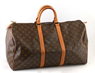 Louis Vuitton Brown Monogram Coated Canvas  50 Keepall Travel Bag, the vachetta leather straps with golden brass hardware, opening t...