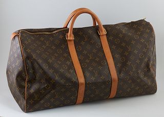 Louis Vuitton Brown Monogram Coated Canvas 55 Keepall Travel Bag, the vachetta leather handles with golden brass hardware, opening t...