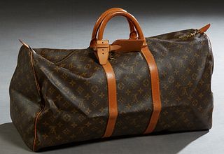 Louis Vuitton Brown Monogram Coated Canvas 55 Keepall Travel Bag, the vachetta leather handles with golden brass hardware, lock and ...