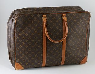 Louis Vuitton Monogram Coated Canvas 50 Sirius Travel Bag, the vachetta leather strips to handles with golden brass hardware, the wr...