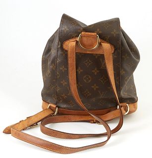 Louis Vuitton Brown Monogram Coated Canvas MM Montsouris Back Pack, with golden brass hardware and adjustable vachetta leather strap...