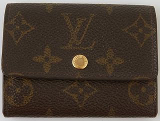 Louis Vuitton Brown Monogram Mini Coin Purse, the coated canvas with a brass snap accent, opening to two coin compartments and one f...