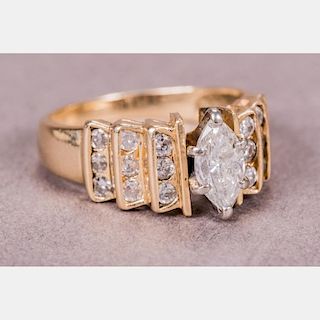 A 14kt. Yellow Gold and Diamond Ring.