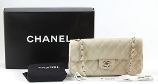 Chanel Ivory Quilted Leather East West Shoulder Bag, c. 2005-2006, the interlaced silver chain with ivory leather, the flap with sil...