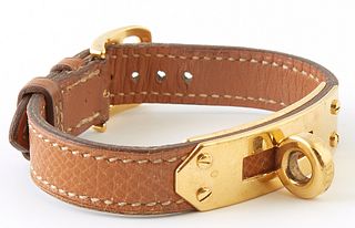 Hermes Brown Calf Leather Kelly Bracelet, c. 1986, with gold hardware, L.- 7 3/4 in.