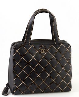 Chanel Black Calf Leather GM Wild Stitch Bowling Bag, c. 2000, with double black leather handles and gold hardware, the interior of...
