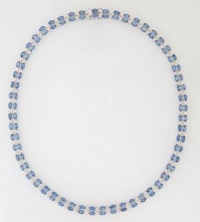 14K White Gold Link Necklace, each of the 56 links with two horizontal blue sapphires, flanked on one side by two round diamonds, to...