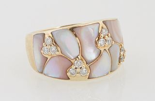 Lady's 14K Yellow Gold Dinner Ring, the wide tapering band mounted with eight shaped mother-of-pearl panels, punctuated by four tria...