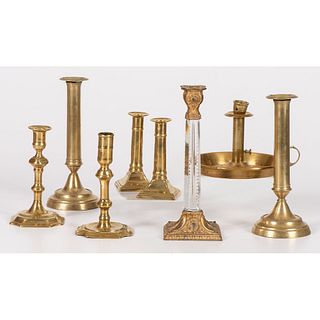 An Assorted Group of Brass Candlesticks