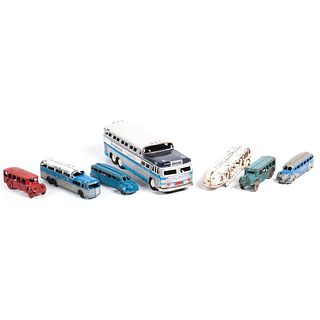 A Group of Greyhound Bus Toys, Plus
