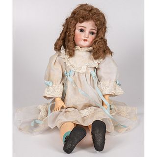 A Bergmann 32 Inch Bisque Head Doll