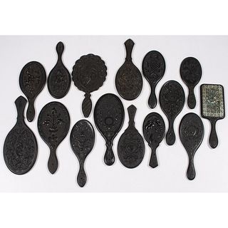 A Group of Thermoplastic Hand Mirrors with Floral and Geometric Designs