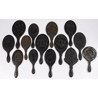 An Assorted Group of Thermoplastic Hand Mirrors with Figural Human and Angel Motifs
