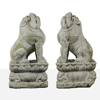 A Pair of Chinese Carved Faux Marble Lions, 20th Century.