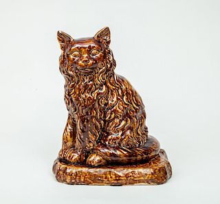 Rockingham Type Tortoise-Glazed Pottery Figure of a Seated Cat