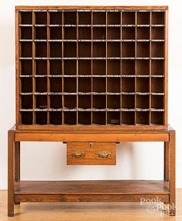 Oak two-part post office cabinet, early 20th c.
