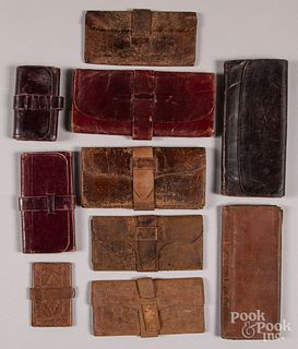 Collection of early leather pocketbooks.